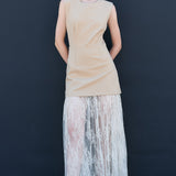 Front view of taupe sleeveless mini dress layered with sheer lace maxi skirt women’s trendy fashion outfit
