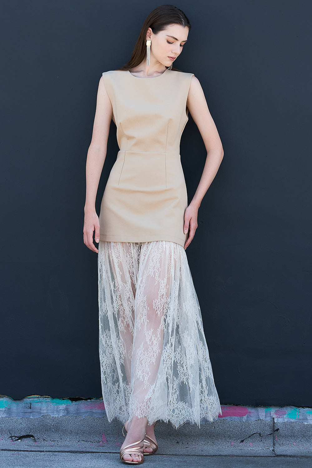 Side view of taupe sleeveless dress with lace layered skirt – modern women’s chic fashion style