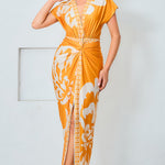 Model wearing floral print v-neck midi dress in mustard