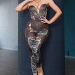 Side view of a woman wearing a deep V denim-effect bustier top and high-waisted leggings set from StyleVava, styled for a night-out look.