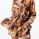 long sleeve button down shirt and short pants set