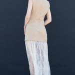 Back view of taupe sleeveless dress with layered lace maxi skirt – elegant women’s evening wear