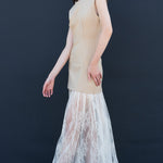 Minimalist taupe sleeveless dress with sheer lace maxi skirt sophisticated women’s fashion design 2025