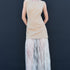 Front view of taupe sleeveless mini dress layered with sheer lace maxi skirt women’s trendy fashion outfit