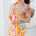 short deep v neck collared jersey dress in orange