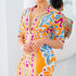short deep v neck collared jersey dress in orange